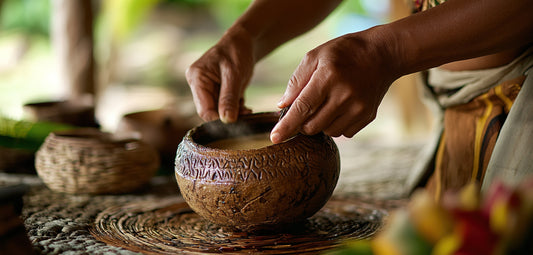 A person preparing a kava beverage